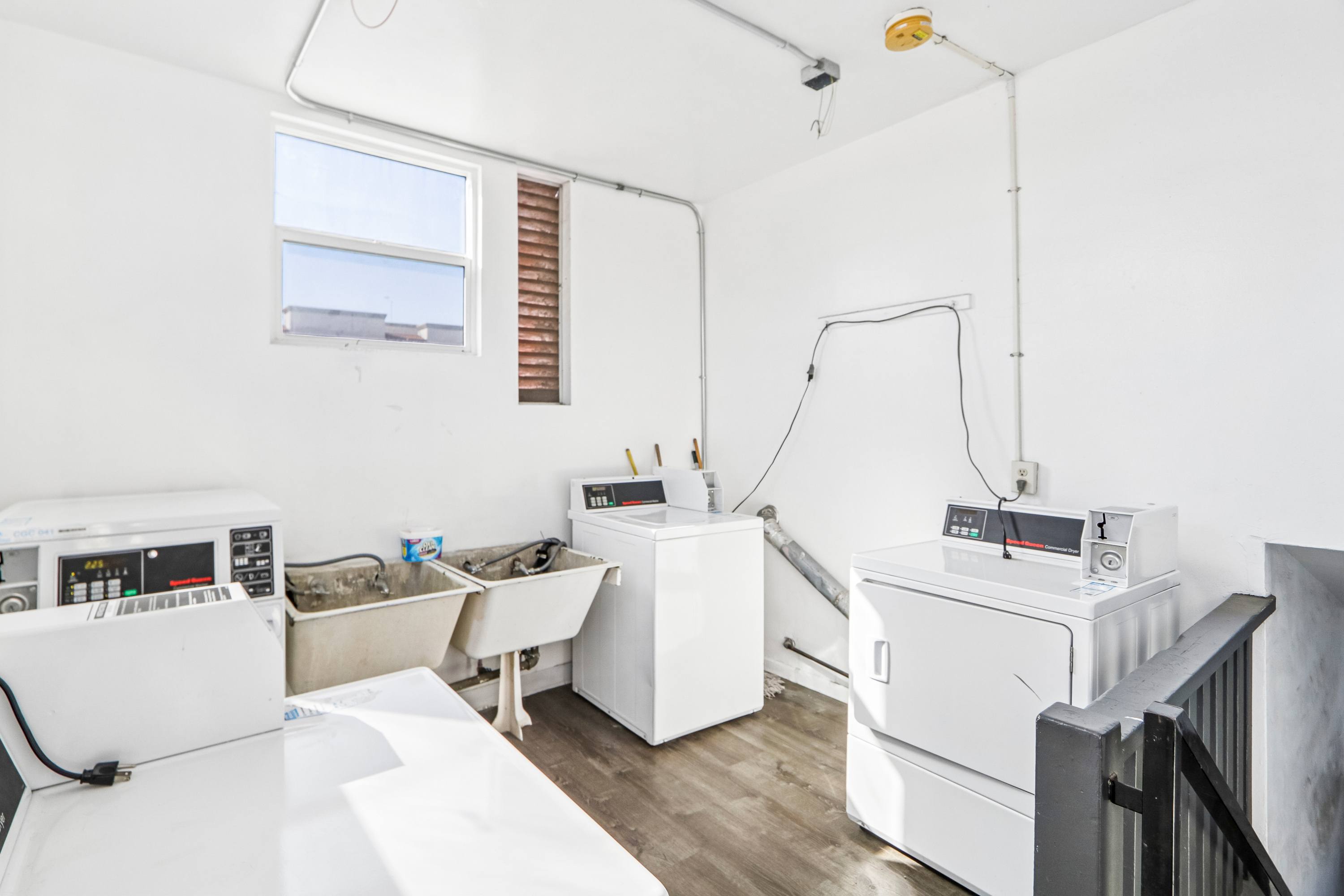 A laundry room with a washer and dryer.